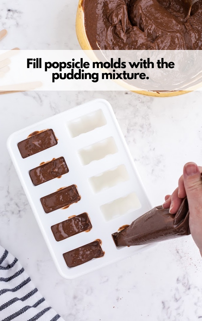 fill popsicle molds with pudding mixture