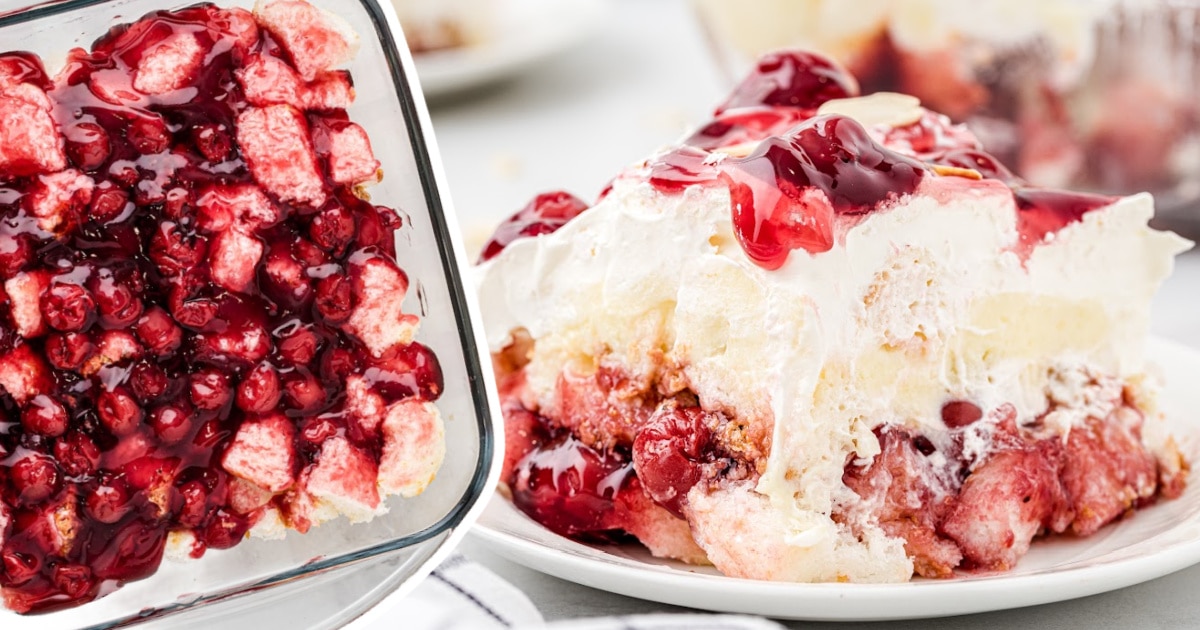 A slice of cake is on a white plate beside a baking dish with some of the layers of cake in it.