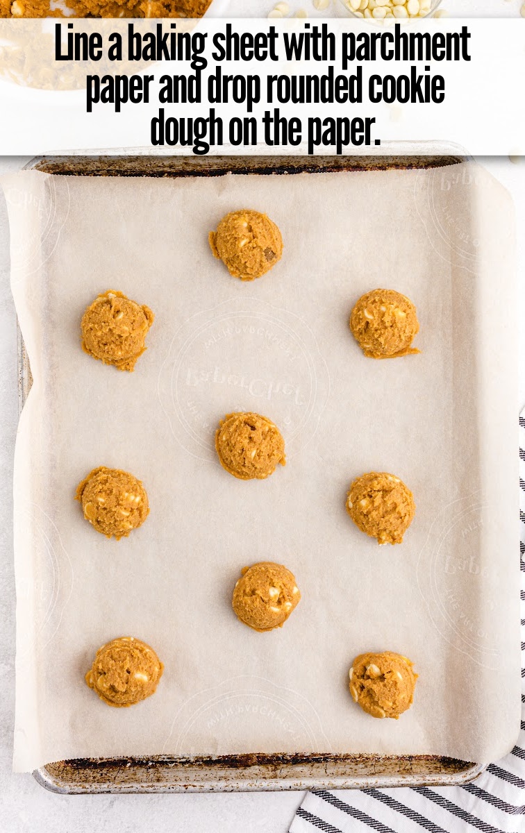 lined Pumpkin Spice Pudding Cookies dough in baking sheet