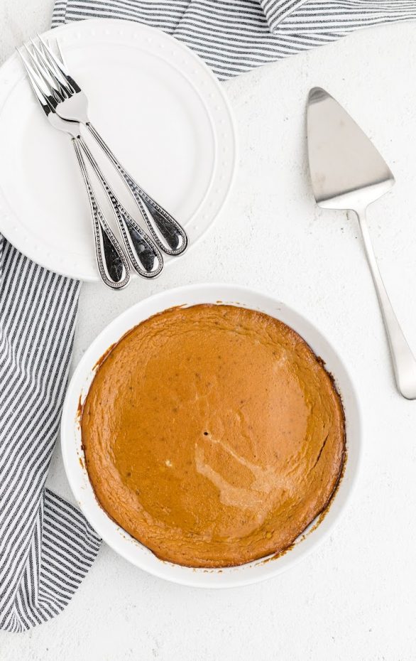 A close up of a plate on a table, with Pumpkin and Pie