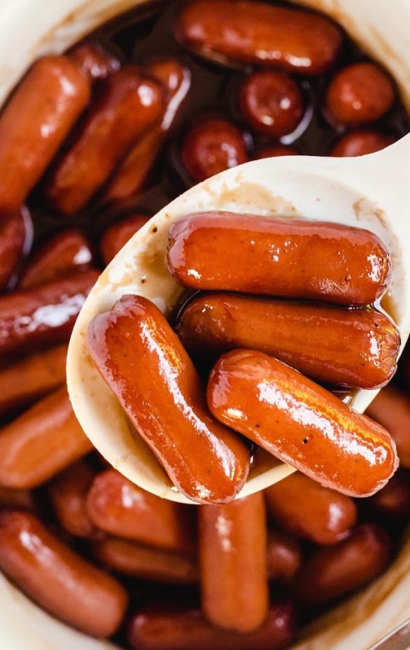 A plate of hot dogs, with Sausage