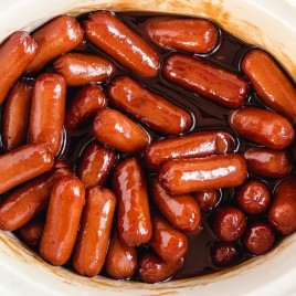 A bunch of hot dogs on a plate