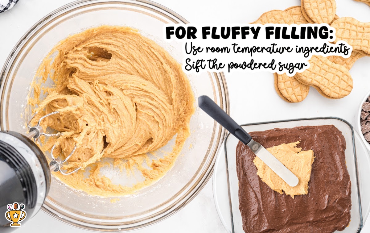 Overhead view of a glass mixing bowl filled with creamy peanut butter filling next to a baking pan with a chocolate pudding layer. A spatula spreads the peanut butter layer over the chocolate layer. Text overlay reads &ldquo;For Fluffy Filling: Use room temperature ingredients, Sift the powdered sugar.&rdquo; Step-by-step image for peanut butter dream bars recipe.