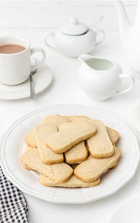 A plate of food and a cup of coffee, with Cookie and Shortbread