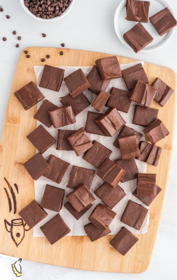 A wooden cutting board, with Fudge and Chocolate