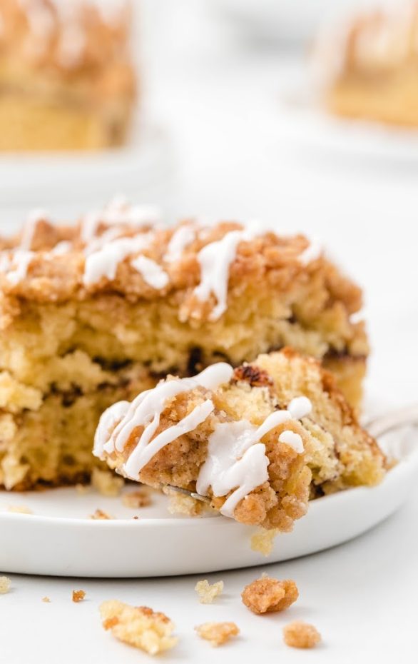 A piece of cake on a plate, with Coffee cake