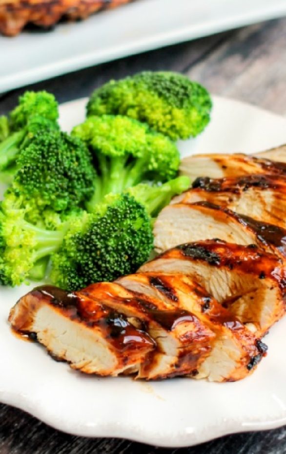 A plate of food with broccoli, with Chicken and Beer marinade