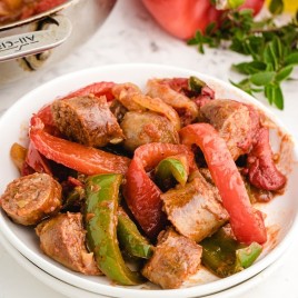 A close up of a plate of food, with Sausage