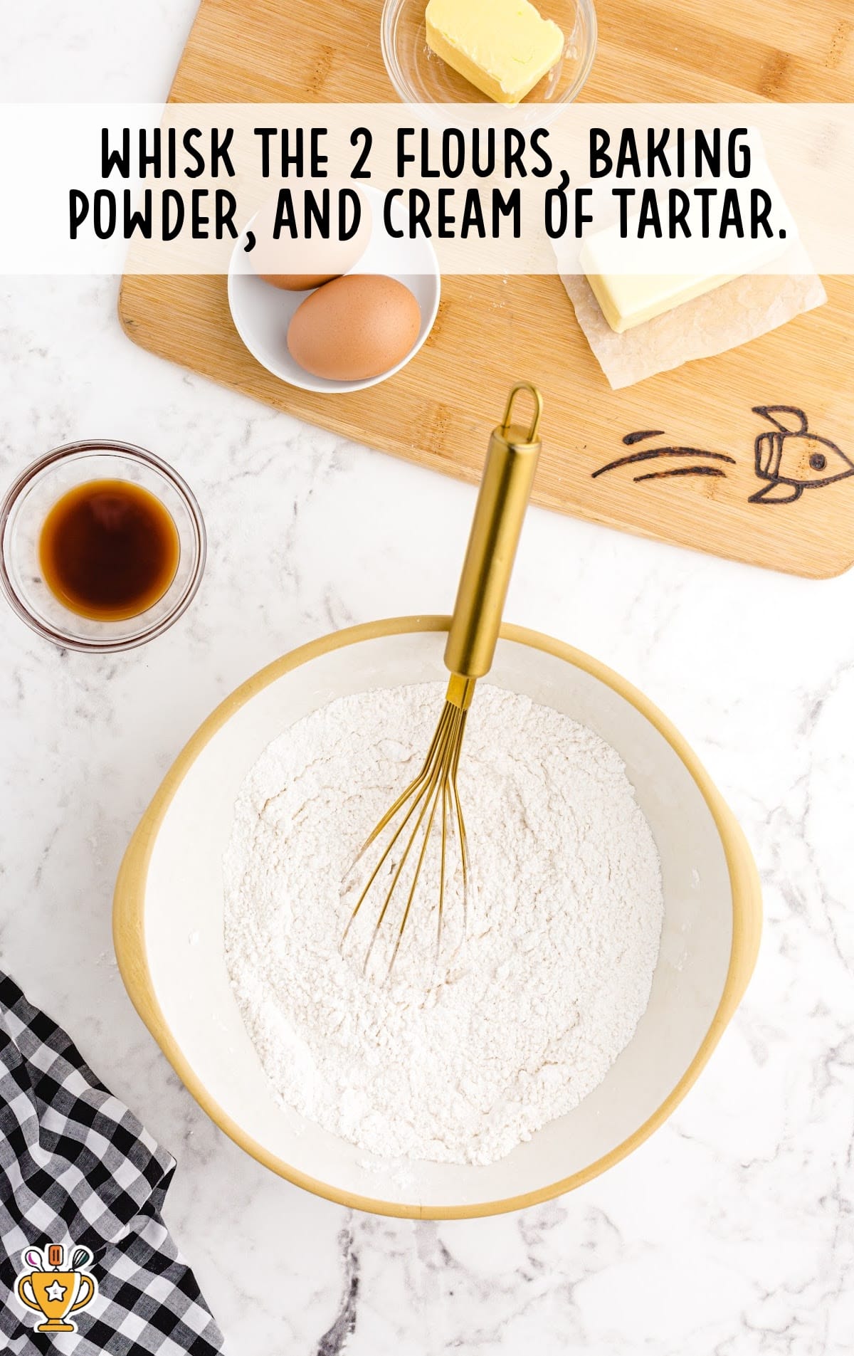 Whisking the flours, baking powder and cream of tartar