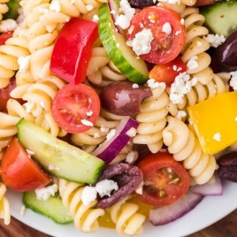 A plate of food, with Pasta and Salad