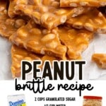 Peanut brittle pieces on crinkled parchment paper with a graphic recipe card listing sugar, corn syrup, butter, peanuts, vanilla, and baking soda for the classic candy.
