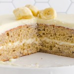 A piece of cake on a plate, with Banana