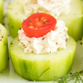 A plate of food, with Cucumber