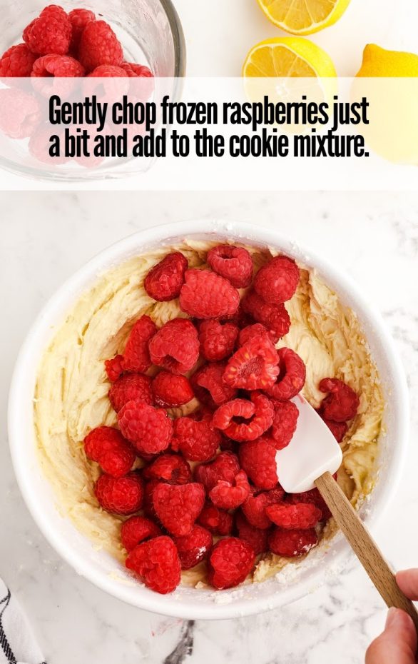 A bowl of fruit on a plate, with Cookie and Raspberry