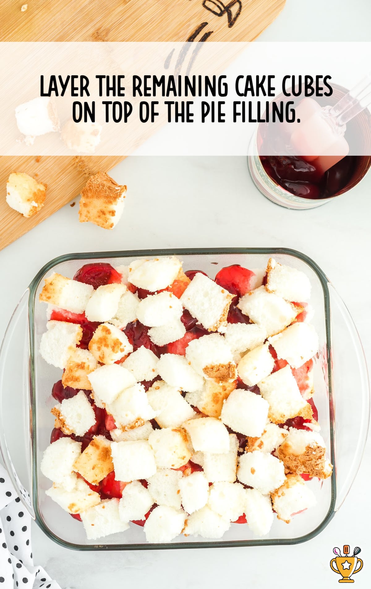 The cake cubes layered with the pie filling.