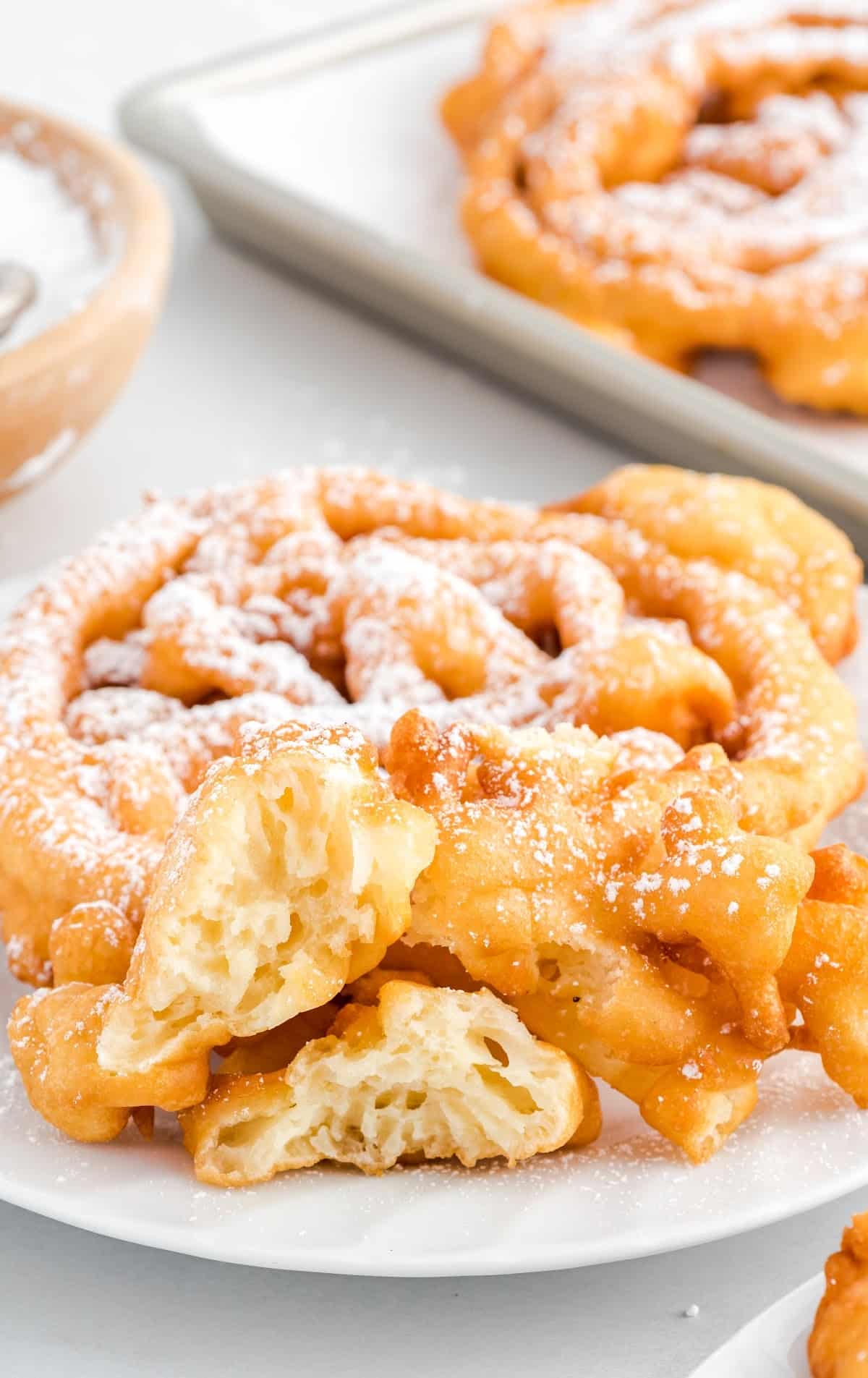 A plate of food, with Funnel cake