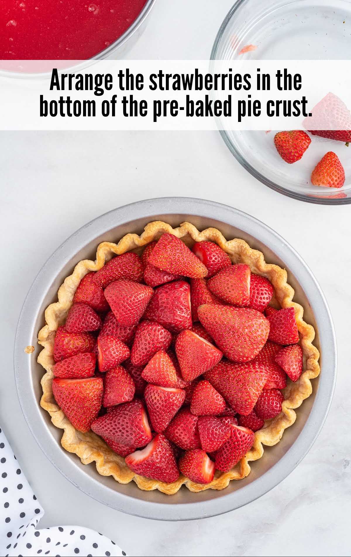A bowl of fruit on a plate, with Pie and Strawberry
