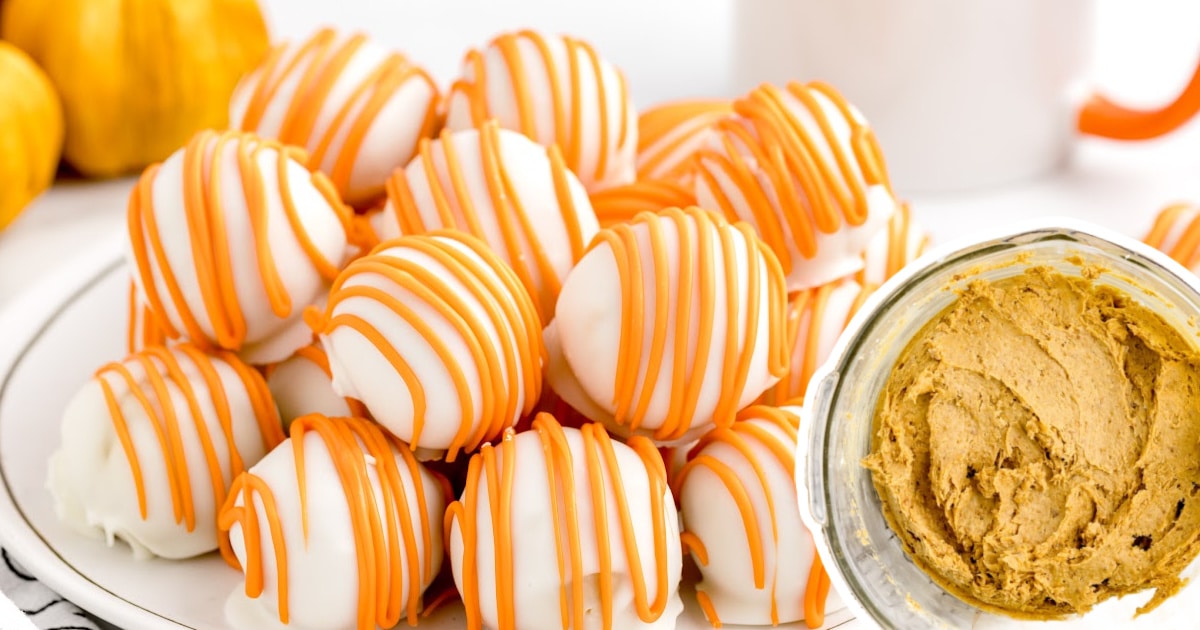 A serving plate of No Bake Pumpkin Cheesecake Balls and a bowl of the filling.