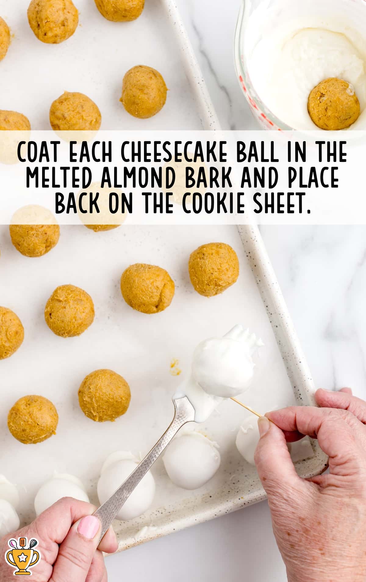 The No Bake Pumpkin Cheesecake Balls are dipped in melted white chocolate.
