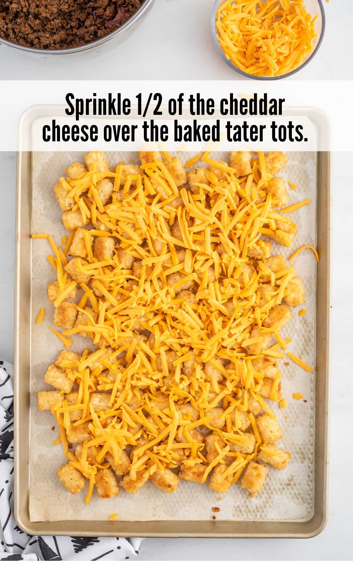 A tray of food, with Nachos and Cheese