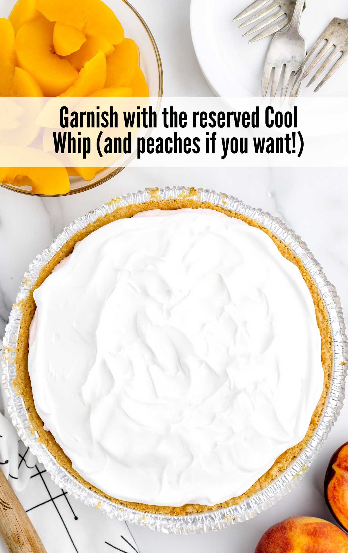 A piece of cake on a plate, with Peach and Cool Whip