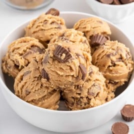A bowl of food on a plate, with Cookie and Dough