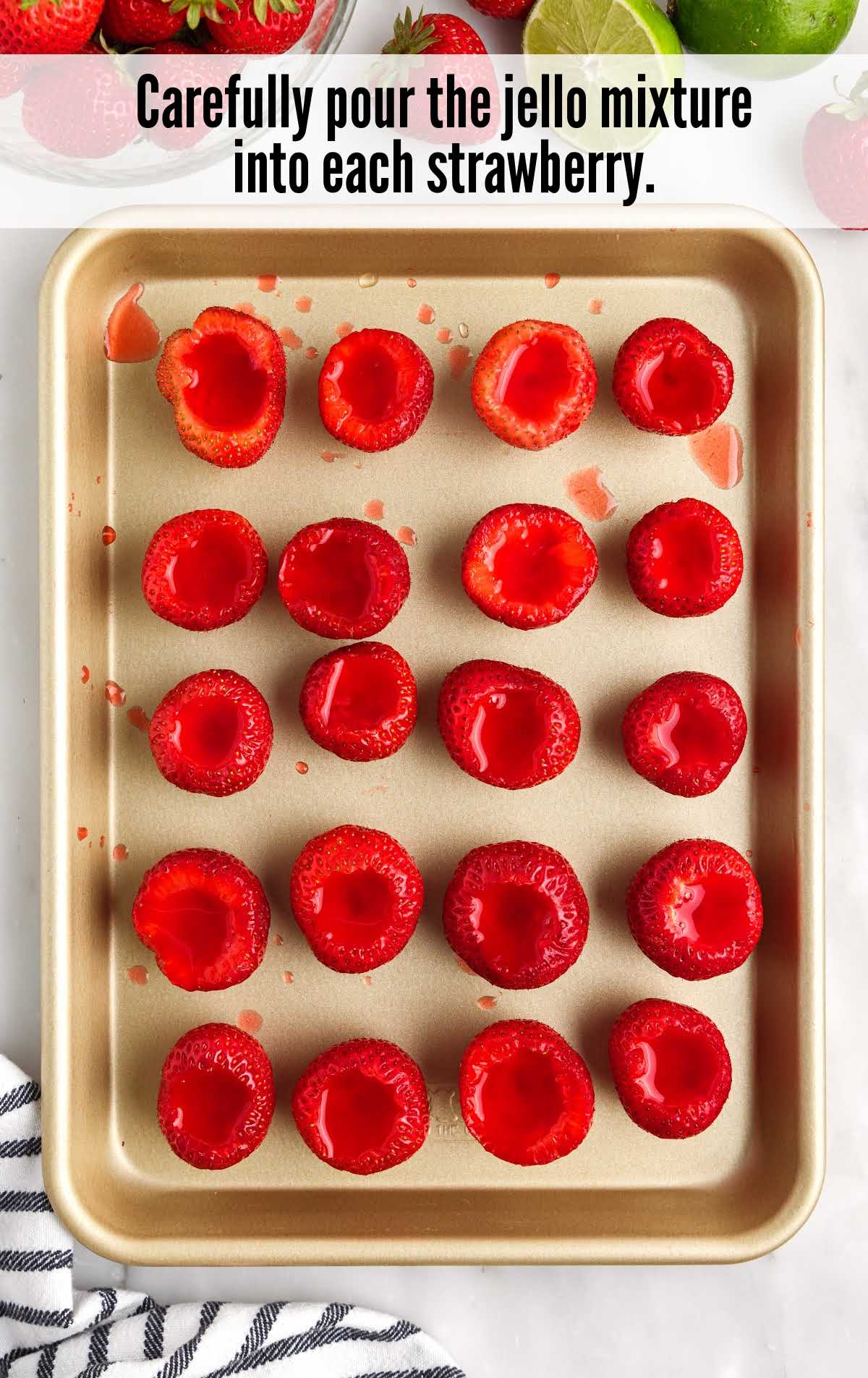 A tray of food, with Strawberry and Jello shot
