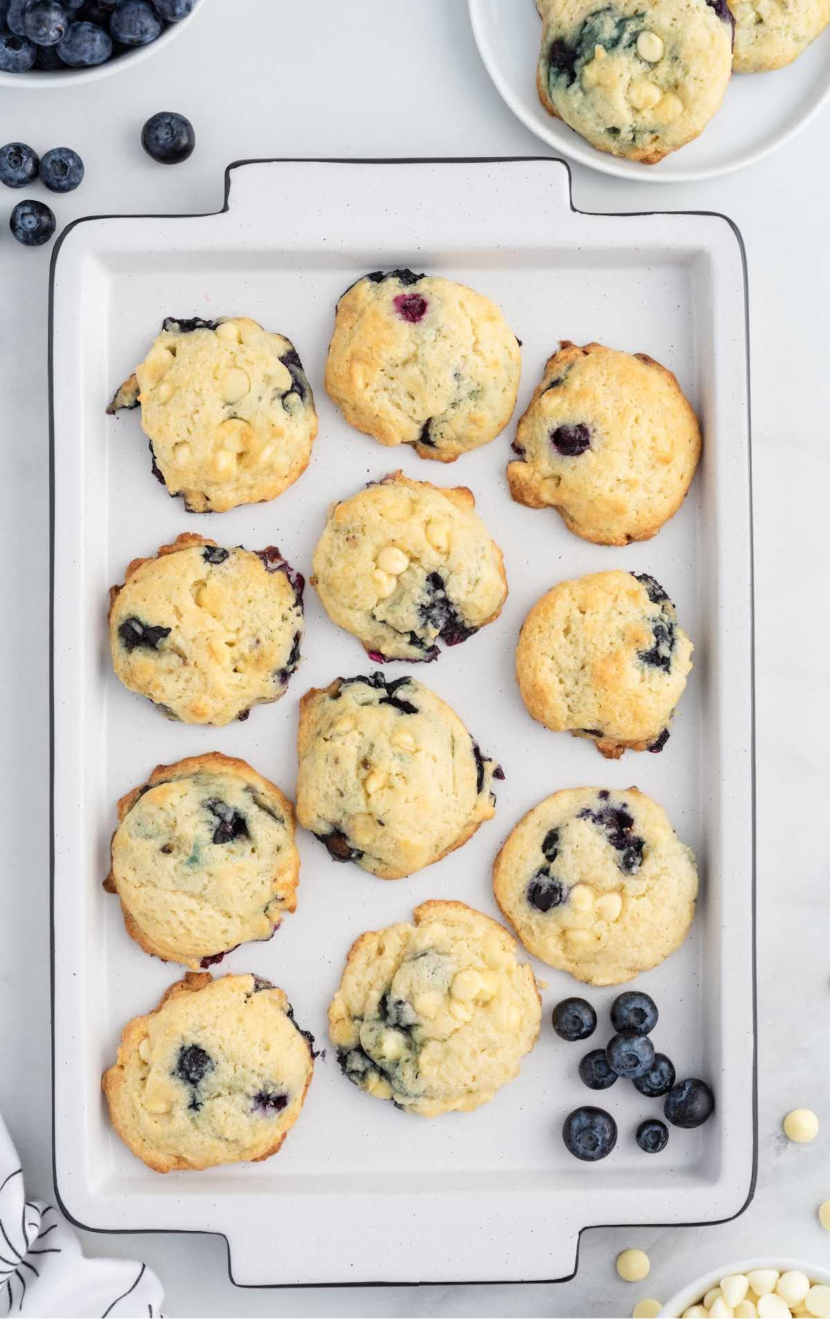 A box filled with different types of food on a plate, with Cookie and Blueberry