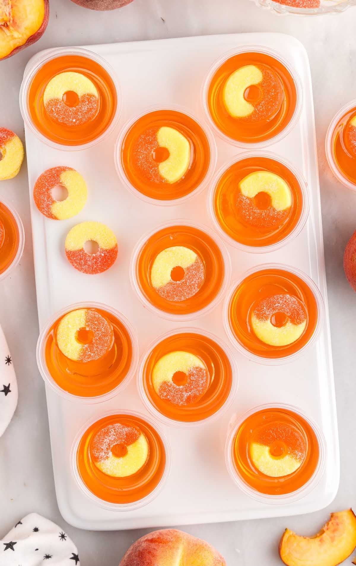A tray full of oranges on a table