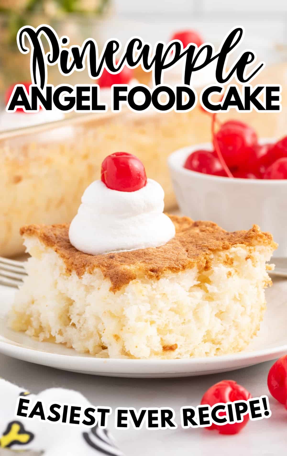 A piece of cake on a plate, with Pineapple and Angel food cake