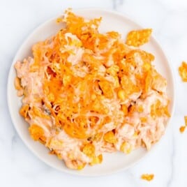 An overhead image of a plate full of doritos casserole.
