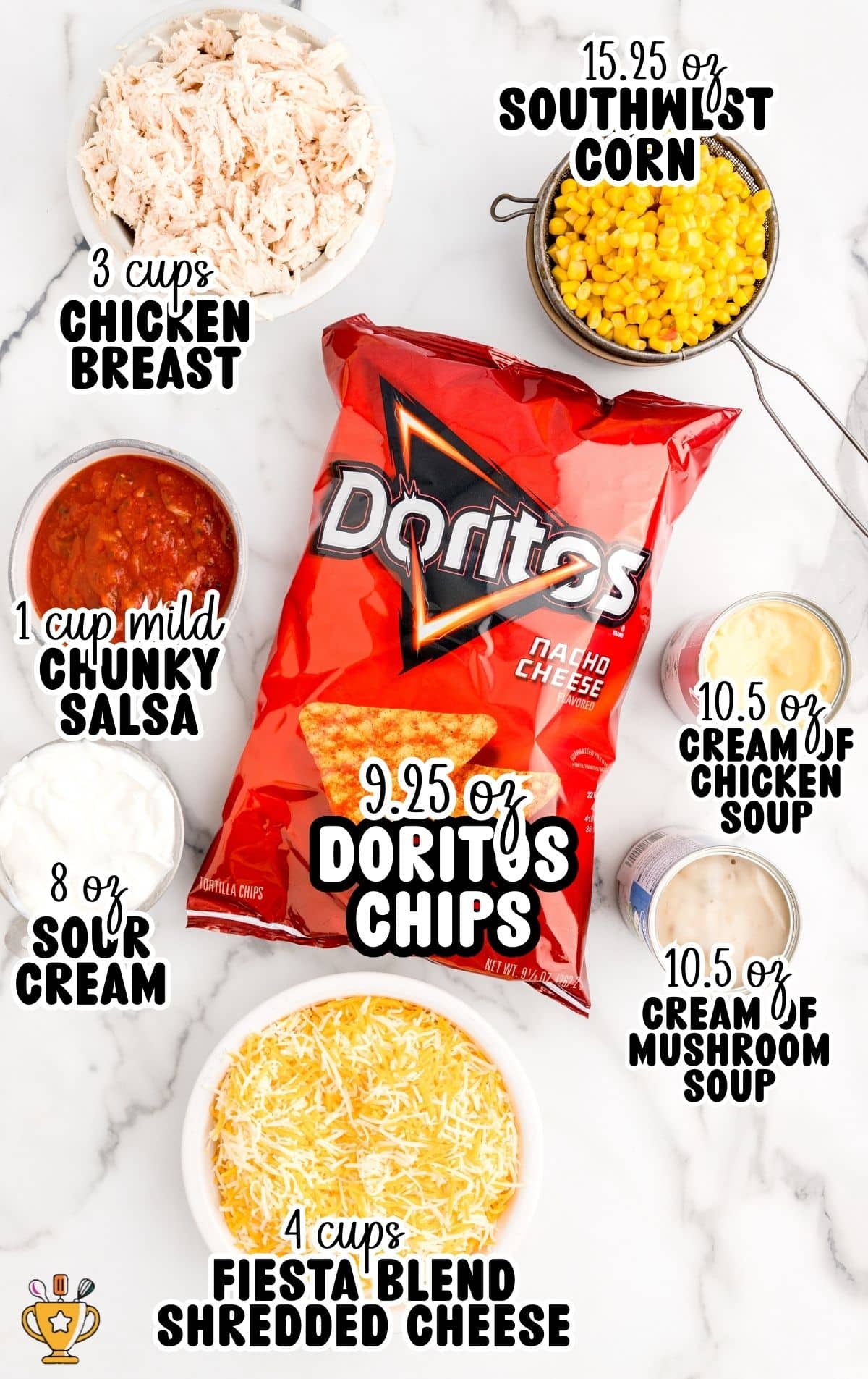 Overhead view of ingredients for cheesy chicken Doritos casserole, including shredded chicken, Doritos chips, corn, shredded cheese, sour cream, salsa, and canned soups.
