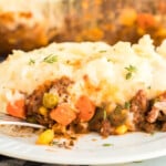 A serving of shepherd's pie on a white plate.