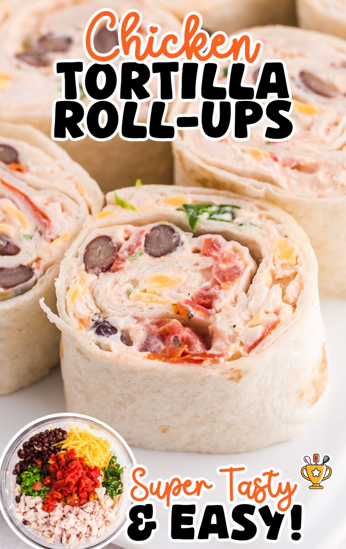 Close-up of sliced chicken tortilla roll-ups filled with shredded chicken, black beans, diced tomatoes, corn, cheese, and green onions wrapped in soft flour tortillas. The creamy filling is swirled inside the tortilla, showing colorful layers of red, yellow, black, and green. Bold text at the top reads &ldquo;Chicken Tortilla Roll-Ups&rdquo; in red and black fonts, while text at the bottom says &ldquo;Super Tasty & Easy!&rdquo; in orange and black with a small gold trophy icon. In the lower left corner, a smaller circular image shows a mixing bowl with the individual ingredients: shredded chicken, black beans, shredded cheddar, chopped green onions, and diced tomatoes.