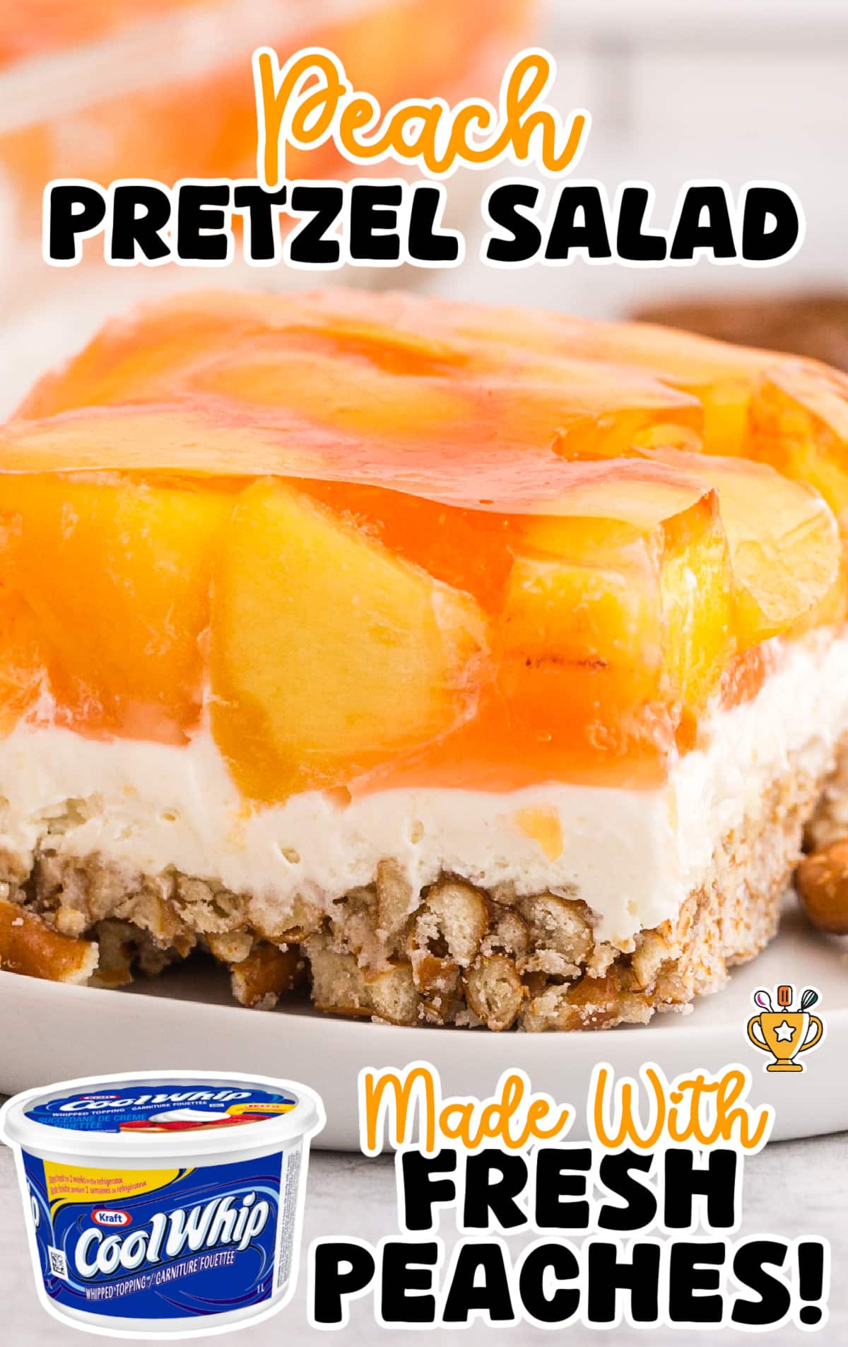 Slice of peach pretzel salad showing three layers: a crunchy pretzel crust on the bottom, creamy white whipped topping and cream cheese filling in the middle, and a glossy peach Jell-O layer with fresh peach slices on top. The dessert is bright orange and golden, with visible pretzel pieces in the crust. Bold text at the top reads “Peach Pretzel Salad” in orange and black fonts, while text at the bottom says “Made With Fresh Peaches!” in orange and black with a small gold trophy icon. In the lower left corner, a small image of a Cool Whip container is included.