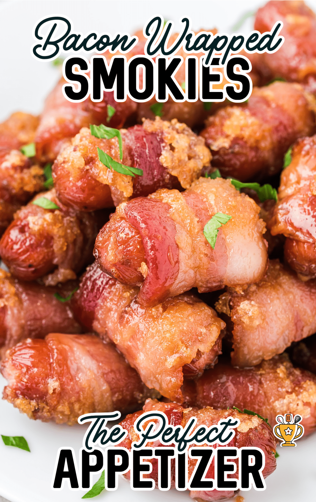 bacon wrapped smokies piled high on a plate ready to serve