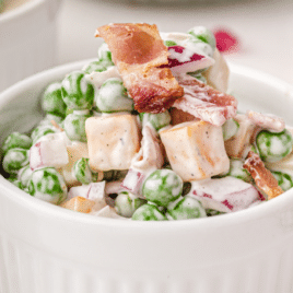 small serving of creamy pea salad with bacon
