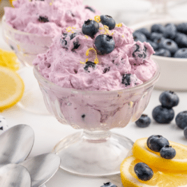 Single serving of blueberry fluff in a glass dish