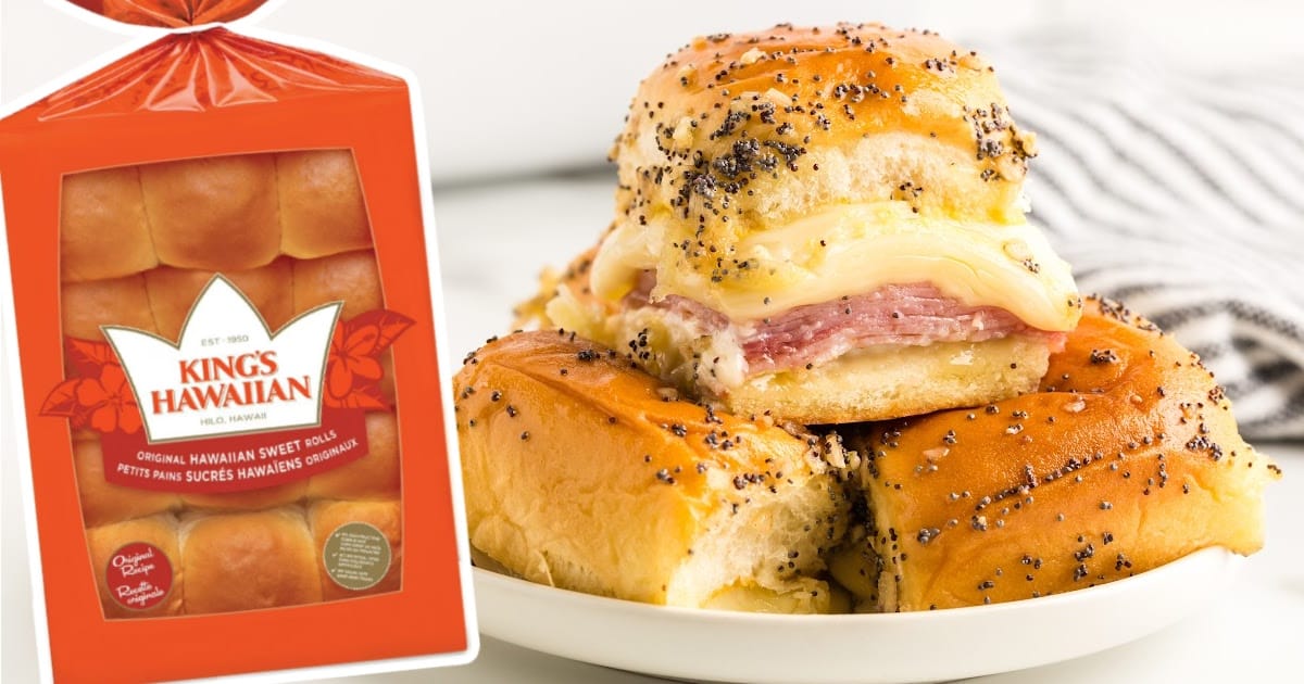 ham and cheese slicers on a white plate with a package of Hawaiian rolls.