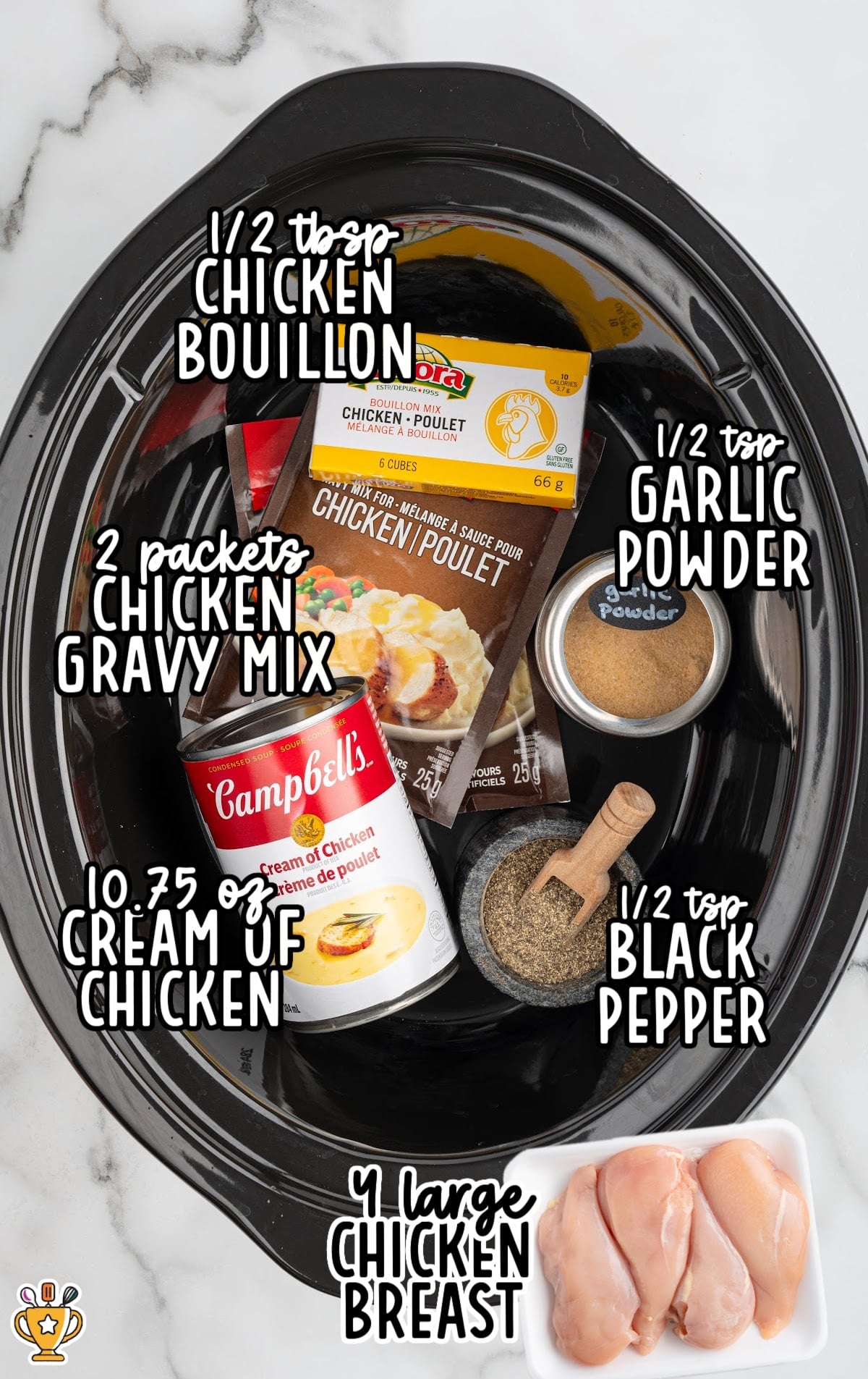 Crockpot ingredients laid out, including chicken breasts, cream of chicken soup, chicken bouillon, gravy mix packets, garlic powder, and black pepper.