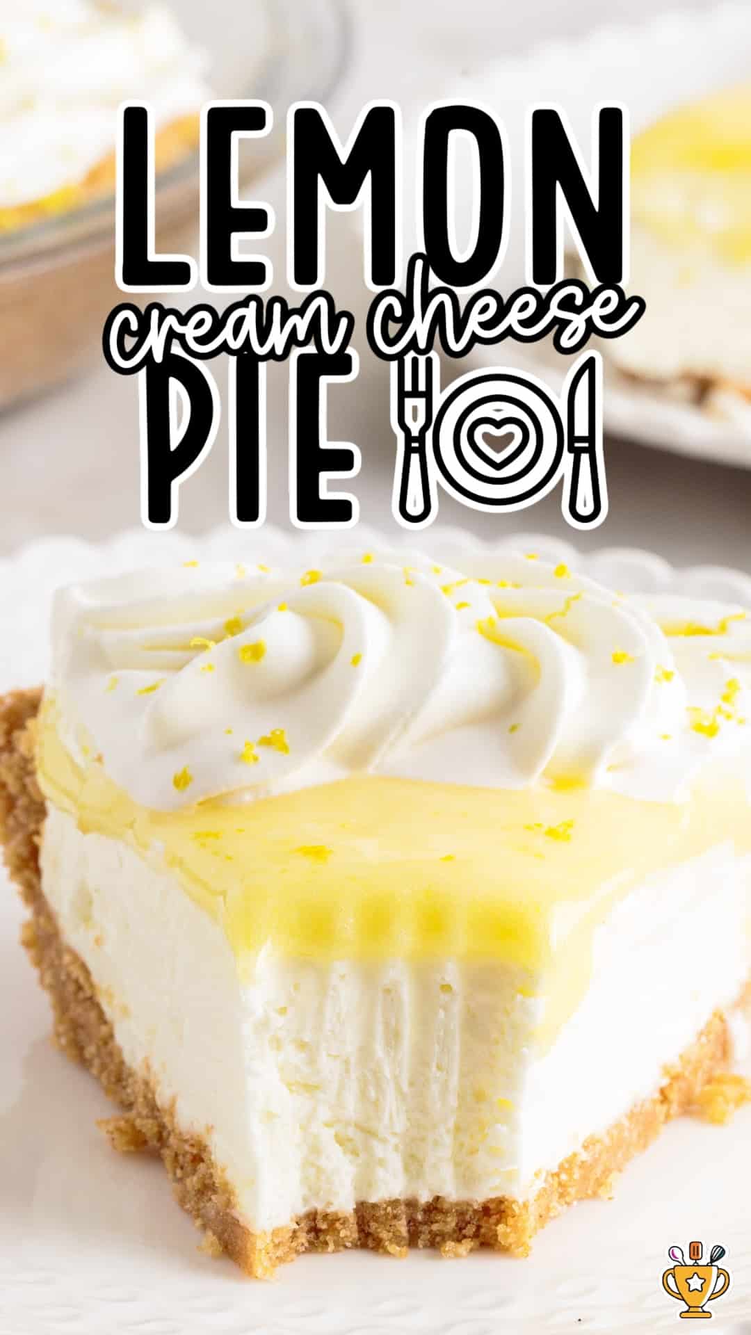 slice of lemon cream cheese pie with a bite taken out of it
