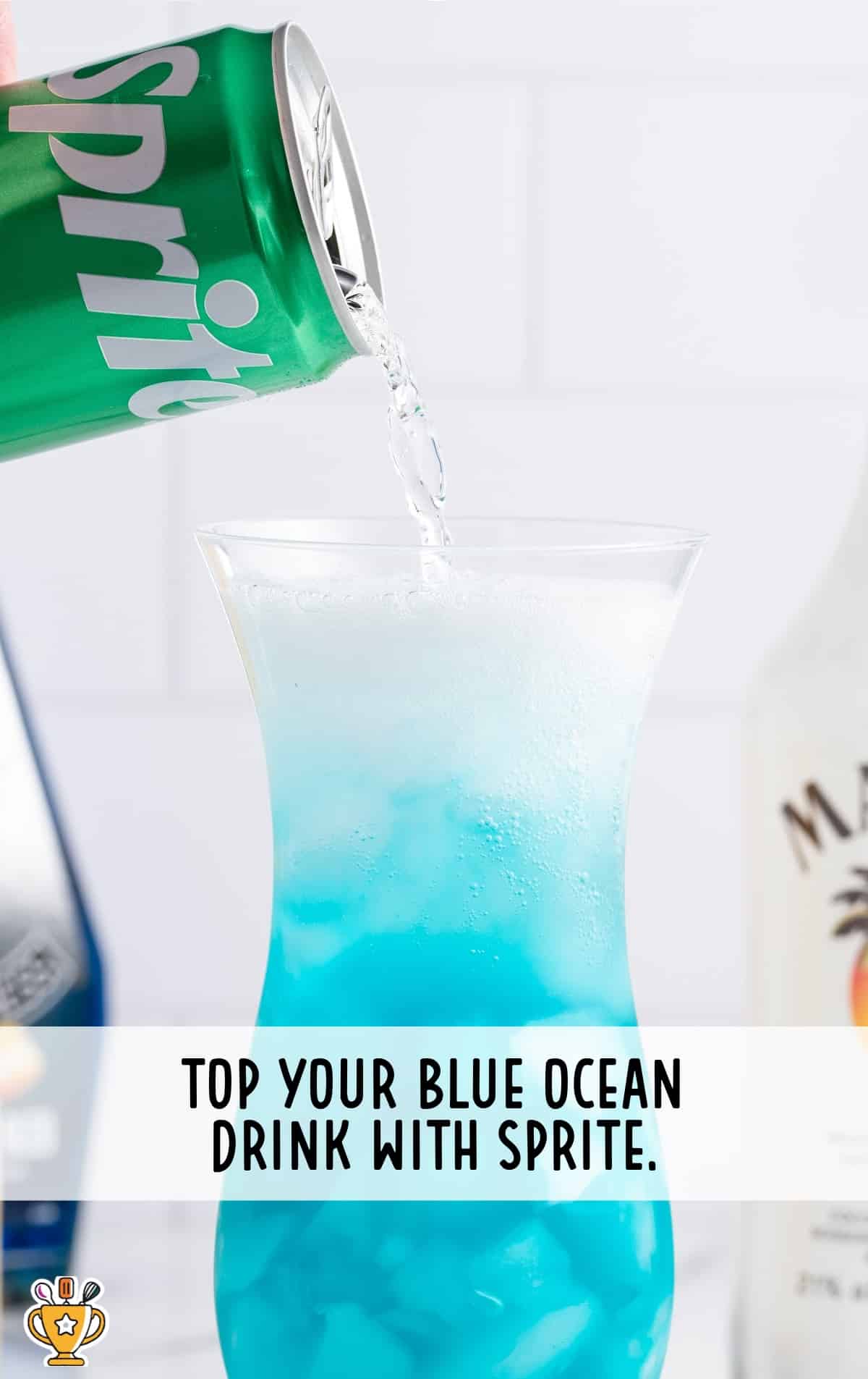 blue ocean drink topped with sprite