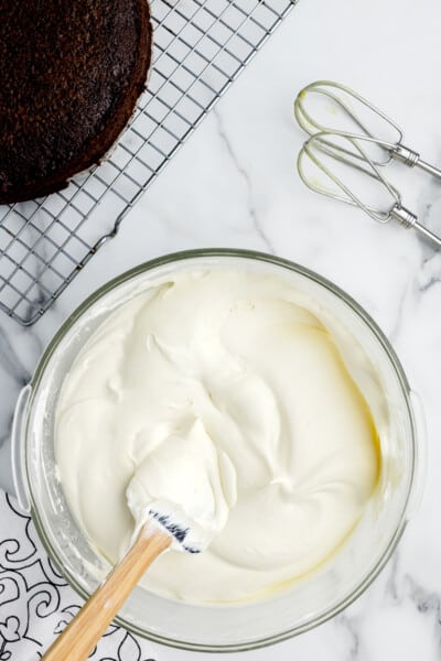 stir the whipped cream topping, cover with plastic, and place in the fridge to chill