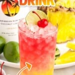 Malibu Cocktail garnished with a cherry, sliced pineapple, and a slice of lime