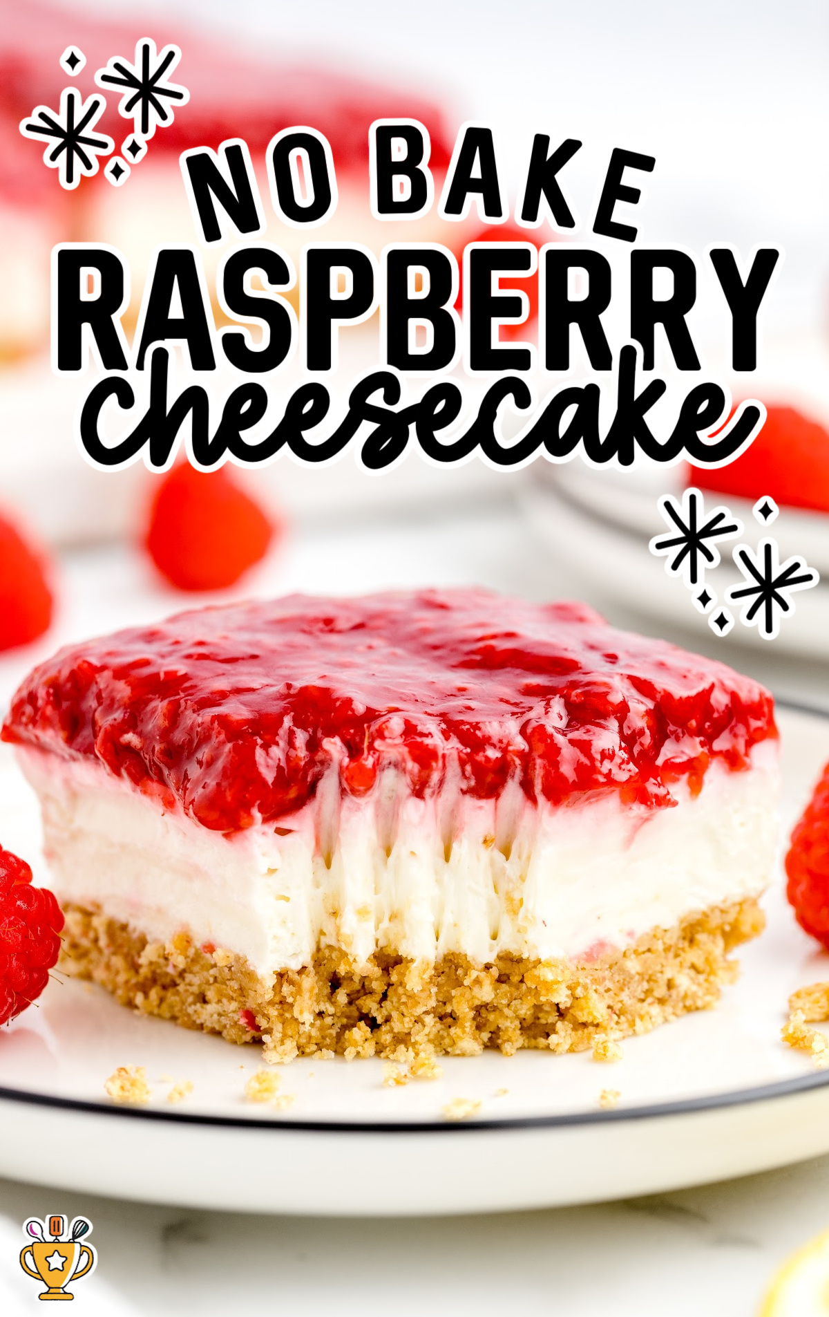 a slice of No Bake Raspberry Cheesecake on a plate with a bite taken out of it