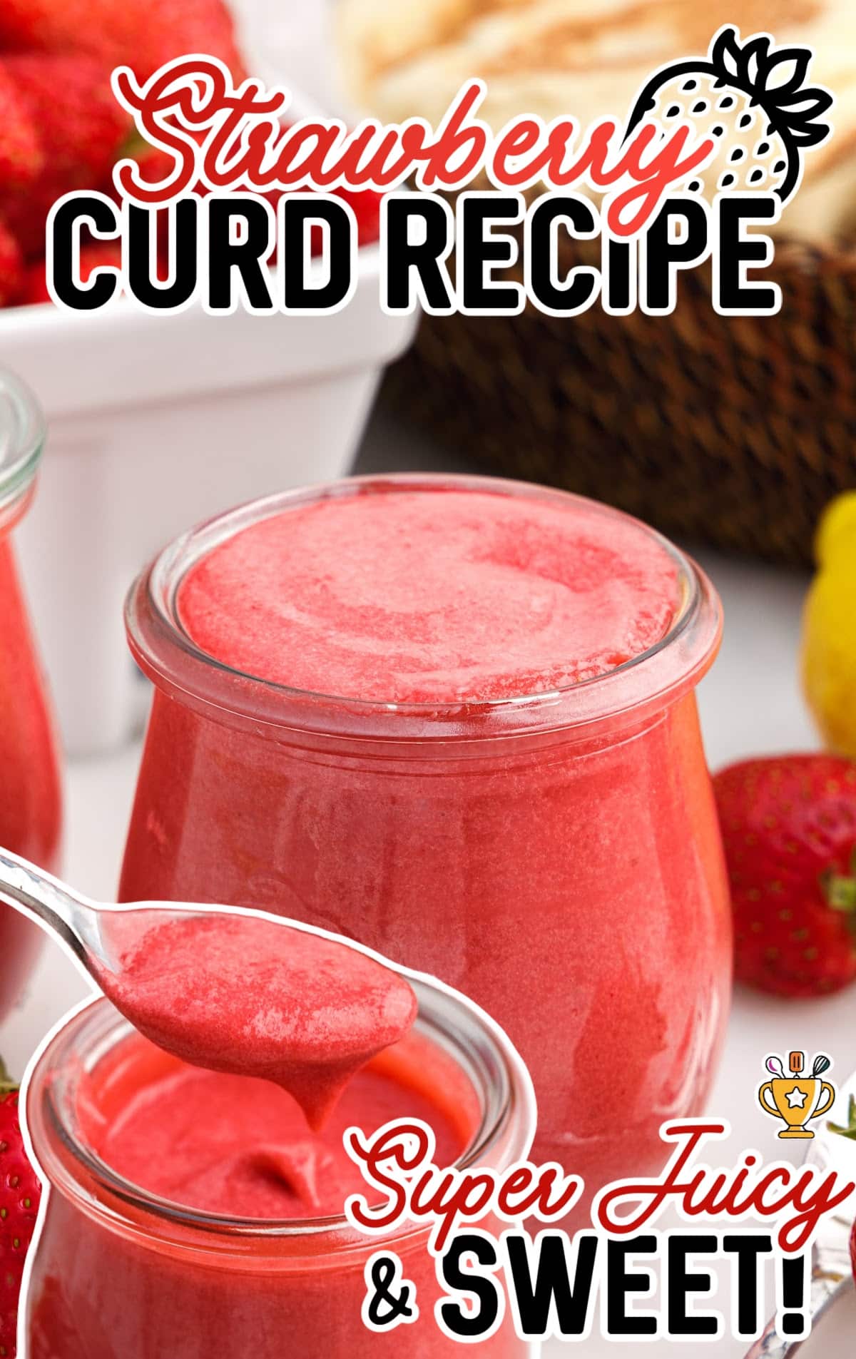 Strawberry Curd in a glass cup with a spoonful of curd