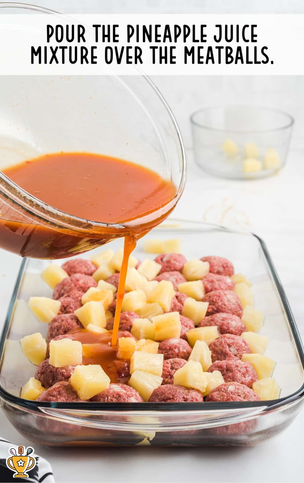 pineapple juice poured over the meatballs