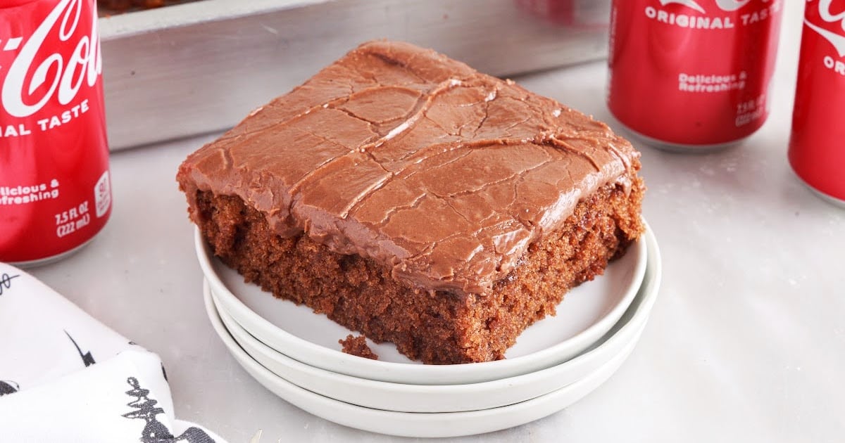 close up shot of chocolate cake recipe in a baking dish with a pice of cake missing