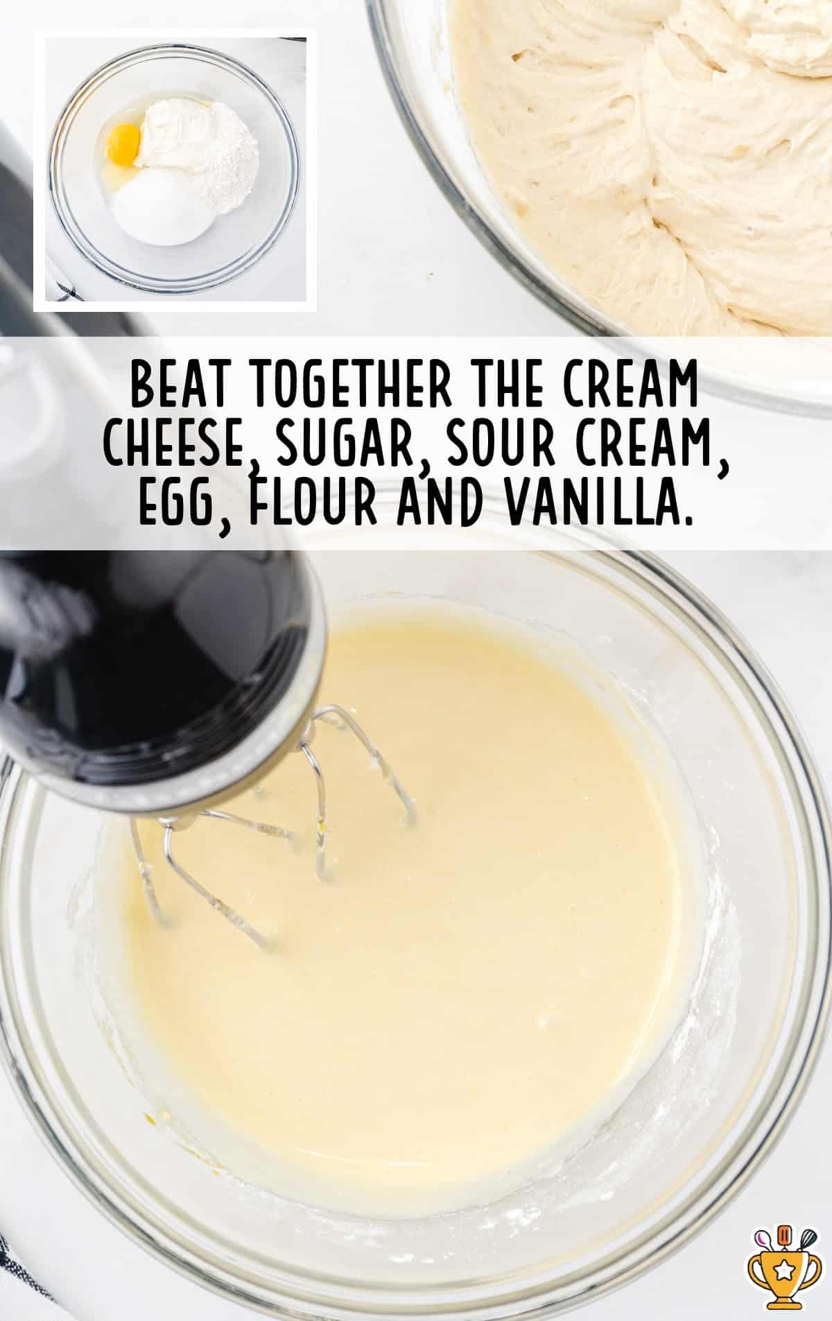 cream cheese, sugar, sour cream, egg, flour and vanilla blended together in a bowl