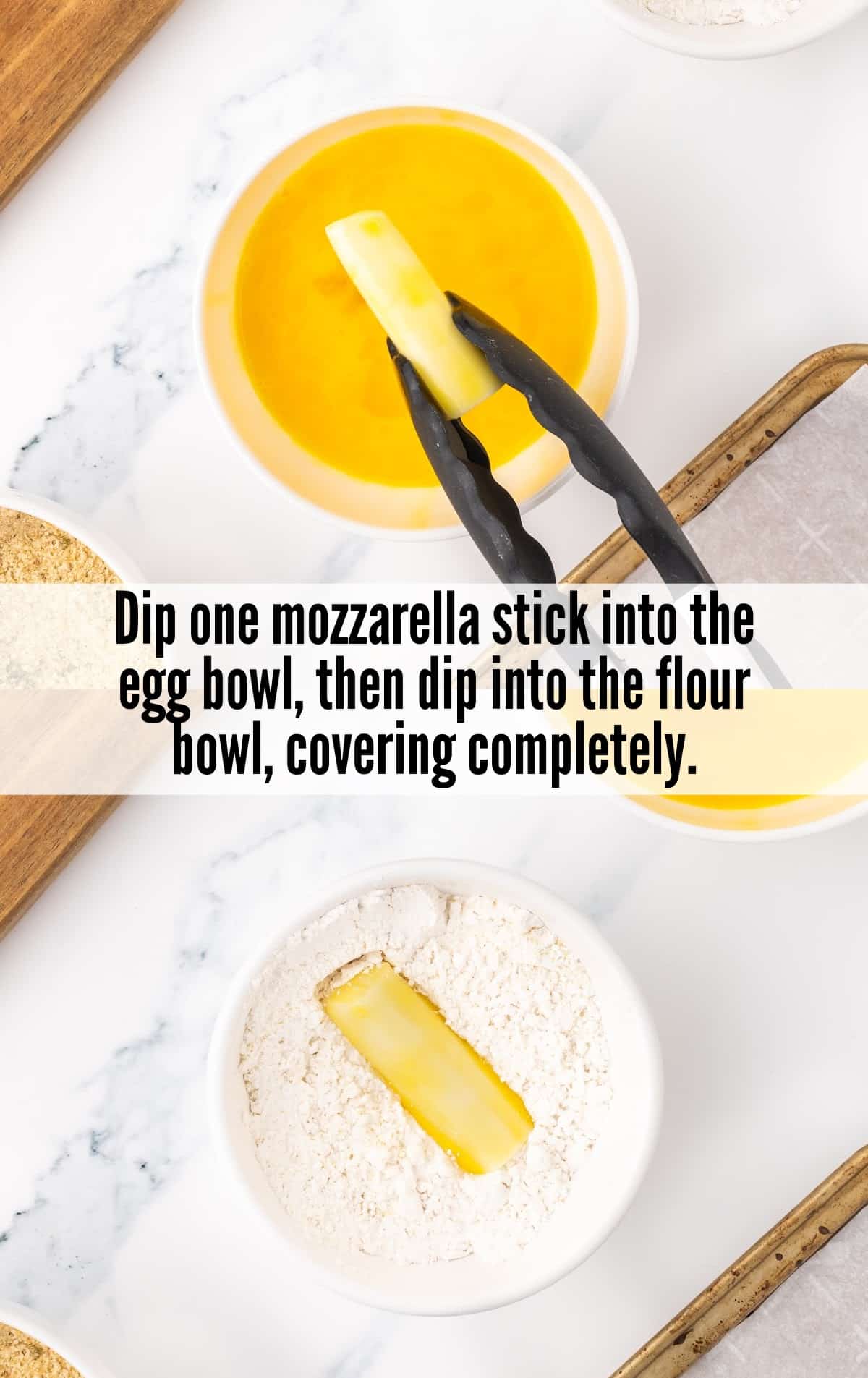 mozzarella stick dipped into the egg bowl and flour